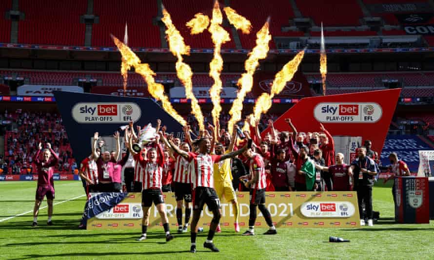 Brentford promoted to Premier League for first time after stinging Swansea | Championship | The Guardian