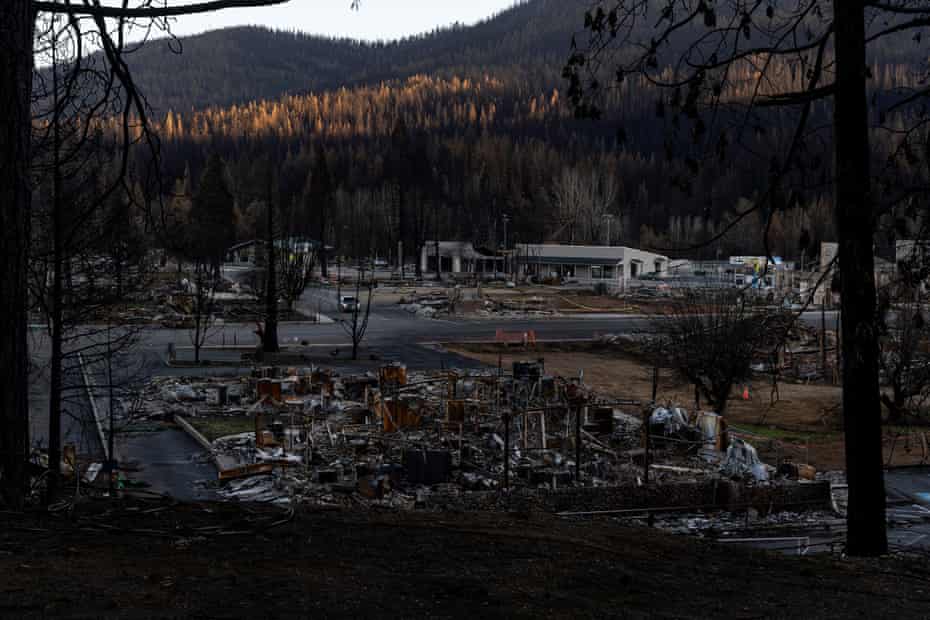 Landscape view of a town covered in debris after a fire