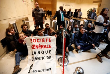 Youth block the French bank Société Générale headquarters as part of an international climate change protest.