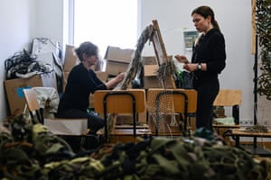 Volunteers weave ghillie suits for Ukrainian army snipers in Lviv, Ukraine