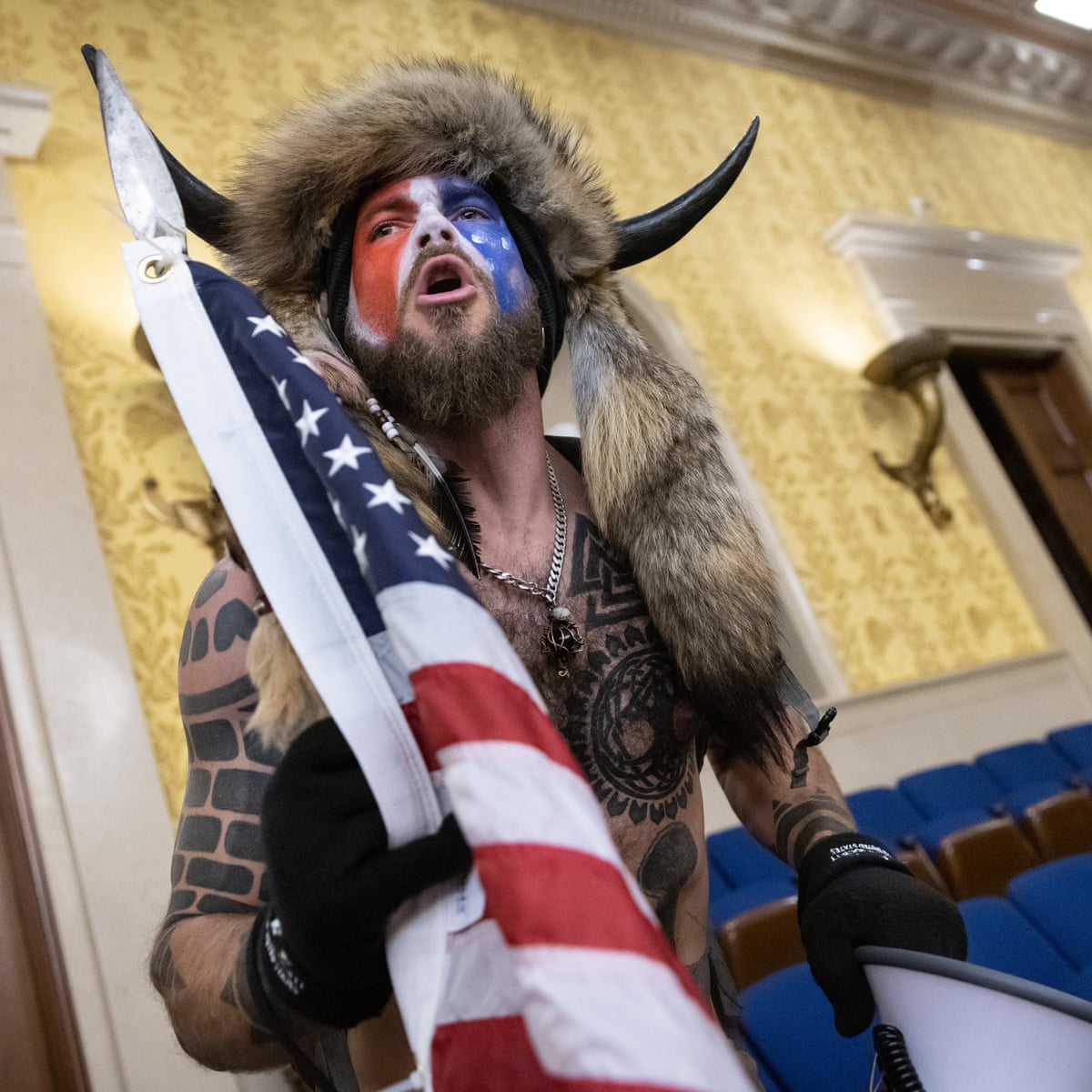 US Capitol rioter who wore horned headdress to be released early | US Capitol attack | The Guardian