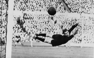West Germany’s goalkeeper Fritz Herkenrath watches as a shot from England’s Roy Bentley flies wide of the upright.
