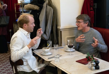 Rupert and Paul chatting over a restaurant table