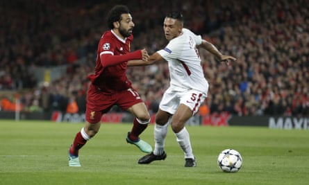 Mohamed Salah ghosts past Roma’s Juan Jesus before setting up Roberto Firmino for Liverpool’s fourth goal.