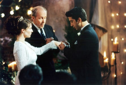 The stand at the altar in front of the celebrant, Schwimmer holding her hand