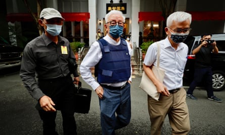 UMC founder Robert Tsao, centre.