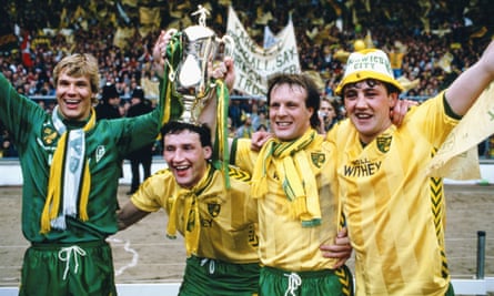 Norwich’s Chris Woods,  Dave Watson, Paul Haylock and Steve Bruce pose with the League Cup after their 1-0 win against Sunderland