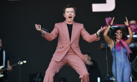 Rick Astley performing on the Pyramid stage.