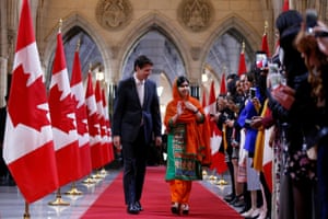 Ottawa, Canada Prime Minister Justin Trudeau walks with Pakistani Nobel Peace Prize laureate Malala Yousafzai