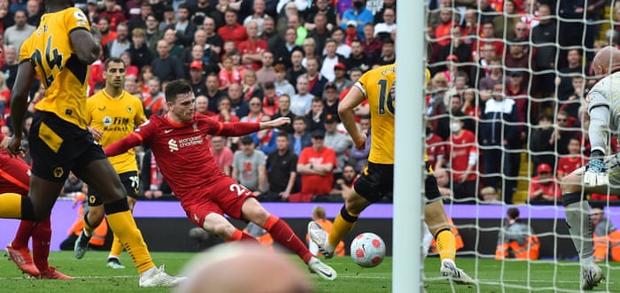 Andy Robertson (centre) of Liverpool makes it 3-1.