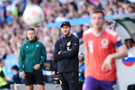 Sébastien Pocognoli looks on from the touchline