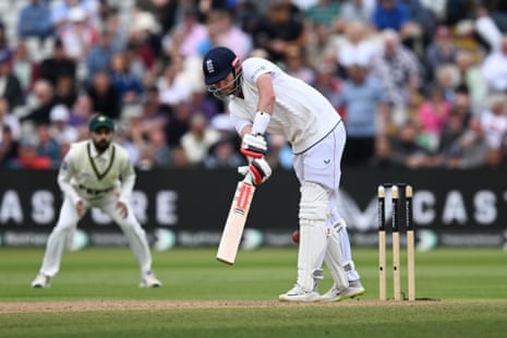 Gus Atkinson of England is struck on the pad by a delivery from Razaullah Khan of Pakistan and was initially given out but was given not out open review.