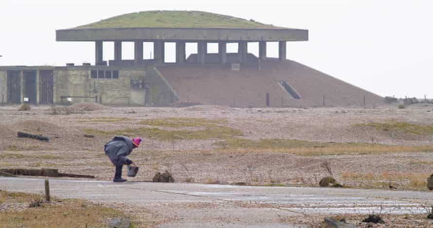 Holley forages in Orford Ness, a scene from the Artangel film The Edge of What (2022)