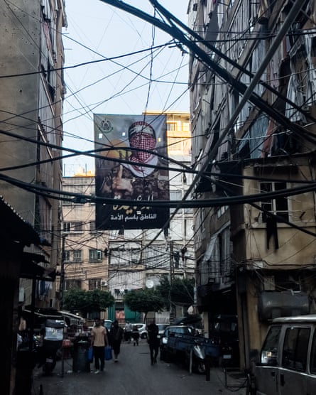A poster strung between buildings in Shatila.