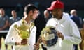 FILE PHOTO: Djokovic and Kyrgios<br>FILE PHOTO: Serbia's Novak Djokovic poses with the trophy after winning the Wimbledon men's singles final alongside runner up Australia's Nick Kyrgios, July 2022. REUTERS/Toby Melville/File Photo