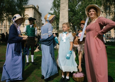 A family wearing period clothes