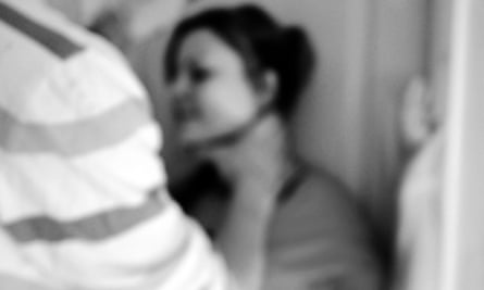 Woman being held at neck by male