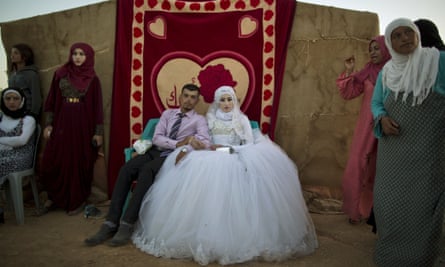 Syrian refugees during their wedding ceremony at a tented settlement in Jordan this year.