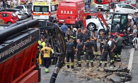 Firefighters attempt to rescue  a man stuck in a collapsed tunnel in Via Innocenzo XI in Rome.