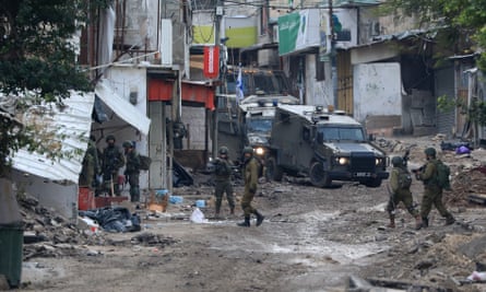 Israeli forces carry out a raid in the West Bank city of Tulkarm