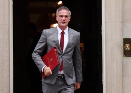 Peter Kyle holds a red folder as he walks out of No 10 Downing Street