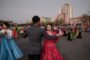 Students participate in a mass dance event outside the indoor stadium in Pyongyang.