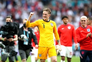 England goalkeeper Jordan Pickford pumps his fist.