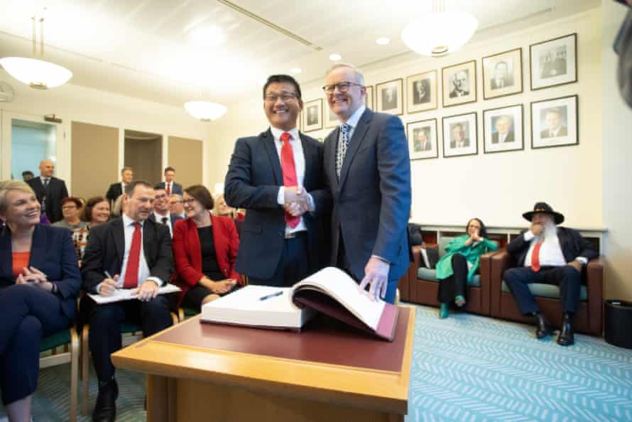 Sam Lim shaking hands with Anthony Albanese