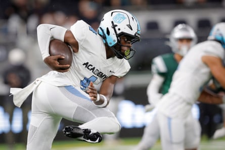 NFL Academy player Thayrancel Pinas from Holland runs with the ball during the match NFL Academy against De La Salle Spartans.
