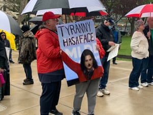 Protesters gather outside the state Capitol in Lansing, Michigan.