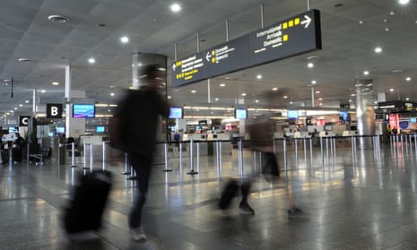 Airline passengers make their way through Melbourne airport