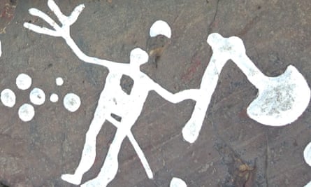 An armed figure portrayed in Bronze Age rock art in Sweden. The original engravings have been painted to display them to the public