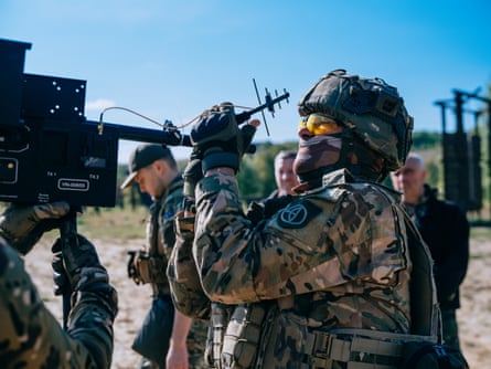 The volunteer soldiers also take time to train, here at the shooting range.