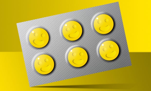 Tablet blister pack with yellow smiley face happy pills