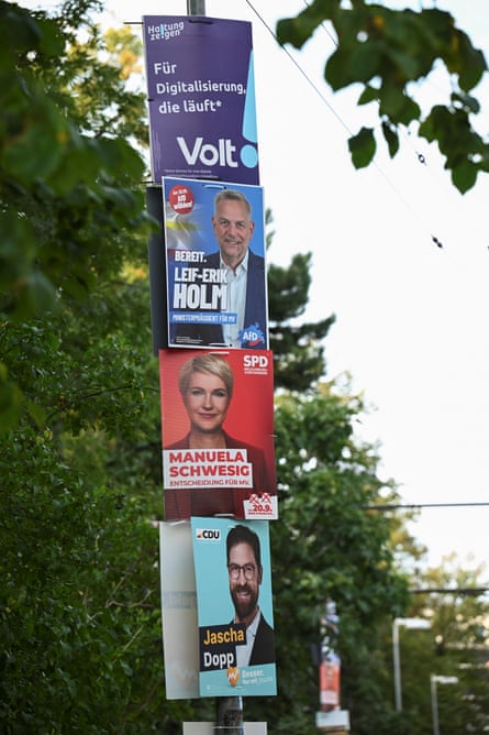 Several candidates feature on posters on street including for AfD and SPD
