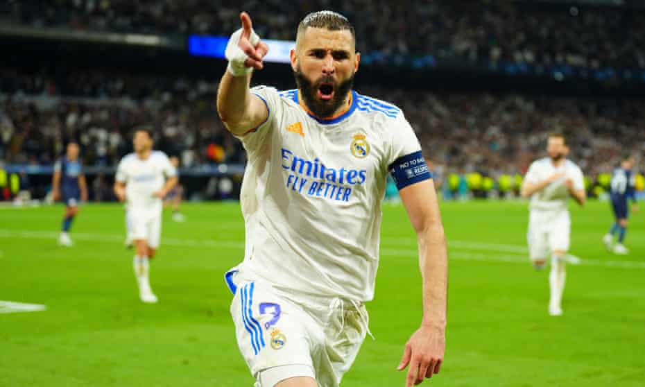 Karim Benzema celebrates after scoring the penalty that made it 3-1 to Real Madrid in the second leg of the semi-final against Manchester City.