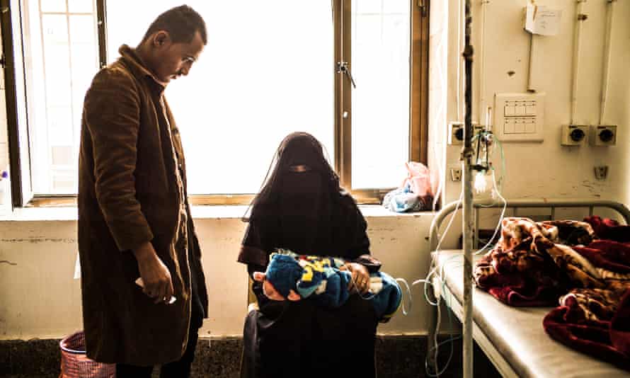 Parents watch over their child at the Sabeen maternity hospital in Sana’a.