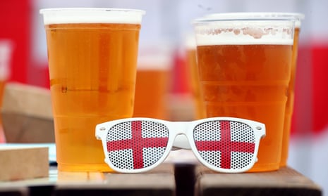 England glasses and pint glasses at the fan zone in Trafford Park, Manchester
