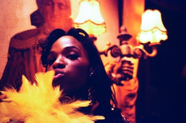 ‘I’ve got so many shots of Winn Austin, the magisterial co-host of Kinky Gerlinky, sashaying along the catwalk while introducing the riotous competitors and guest stars at spectacular Kinky Gerlinky parties (from Rio Carnival fiestas to Night of the Leopards where everyone wore animal prints) but I love this closeup of him taken next to one of the 18th century-inspired light fittings at the Cafe de Paris’