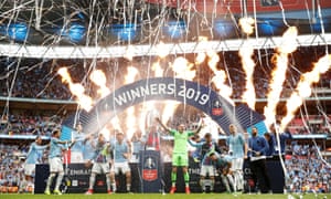 FA Cup Final - Manchester City v Watford<br>Soccer Football - FA Cup Final - Manchester City v Watford - Wembley Stadium, London, Britain - May 18, 2019  Manchester City's Vincent Kompany lifts the trophy as they celebrate after winning the FA Cup  Action Images via Reuters/John Sibley     TPX IMAGES OF THE DAY