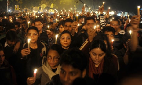  Indian protesters hold candles during a rally in New Delhi, following the gang rape of student Jyoti Singh