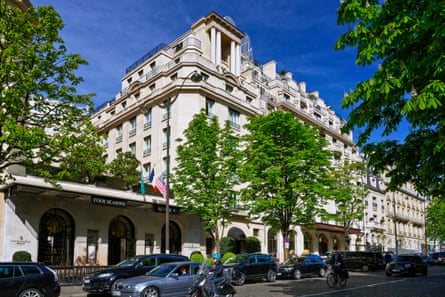 exterior of hotel building surrounded by trees