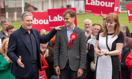 Newly elected Labour MP Keir Mather (centre), with Labour leader, Sir Keir Starmer, and deputy Labour Party leader, Angela Rayner, at Selby football club.