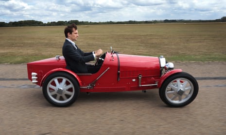 Taking a spin in a Bugatti Baby.