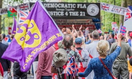 Coalescing … marchers counter London’s 23 June anti-Brexit protest. The 100-strong march was organised by the Football Lads Alliance and the Freedom Association, with Ukip in attendance