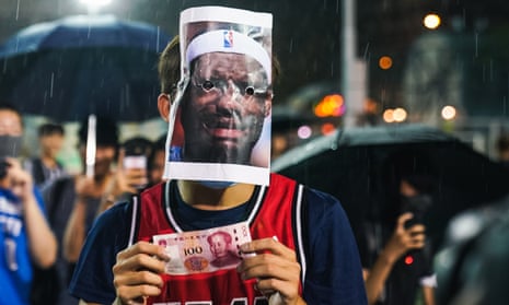A protestor in Hong Kong wears a LeBron James mask after the NBA star’s comments sparked a backlash