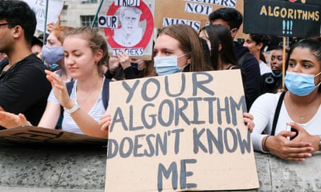 Young people hold up signs, with the central one reading "Your algorithm doesn't know me"