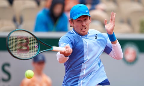 Alex De Minaur plays a forehand against Alex Michelsen in his first round win in the French Open.