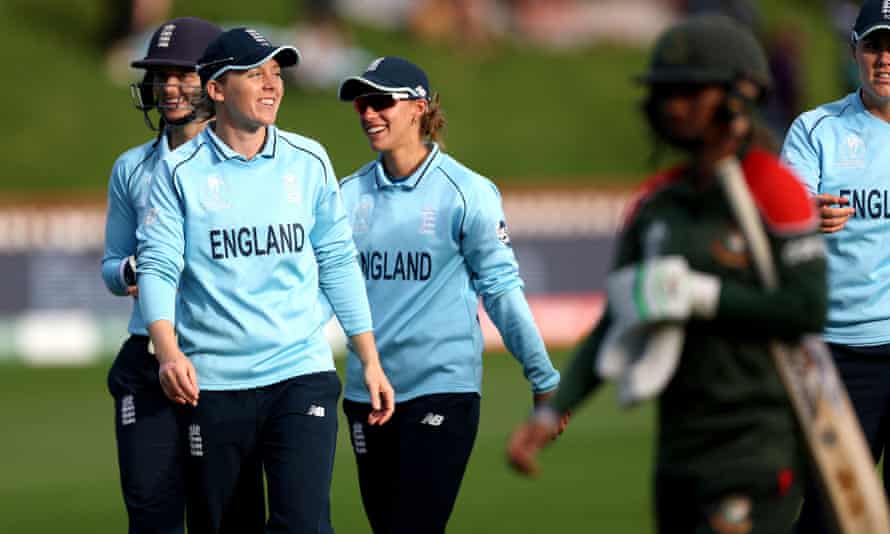 Heather Knight (left) and England enjoy the moment after victory over Bangladesh on Sunday secured their place in the last four.