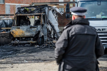 A policeman at the scene of the ambulance station attack